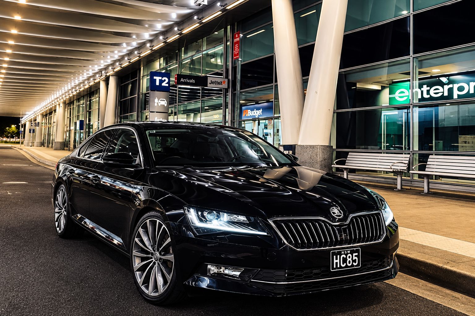 Chauffeured sedan at the airport arrivals terminal